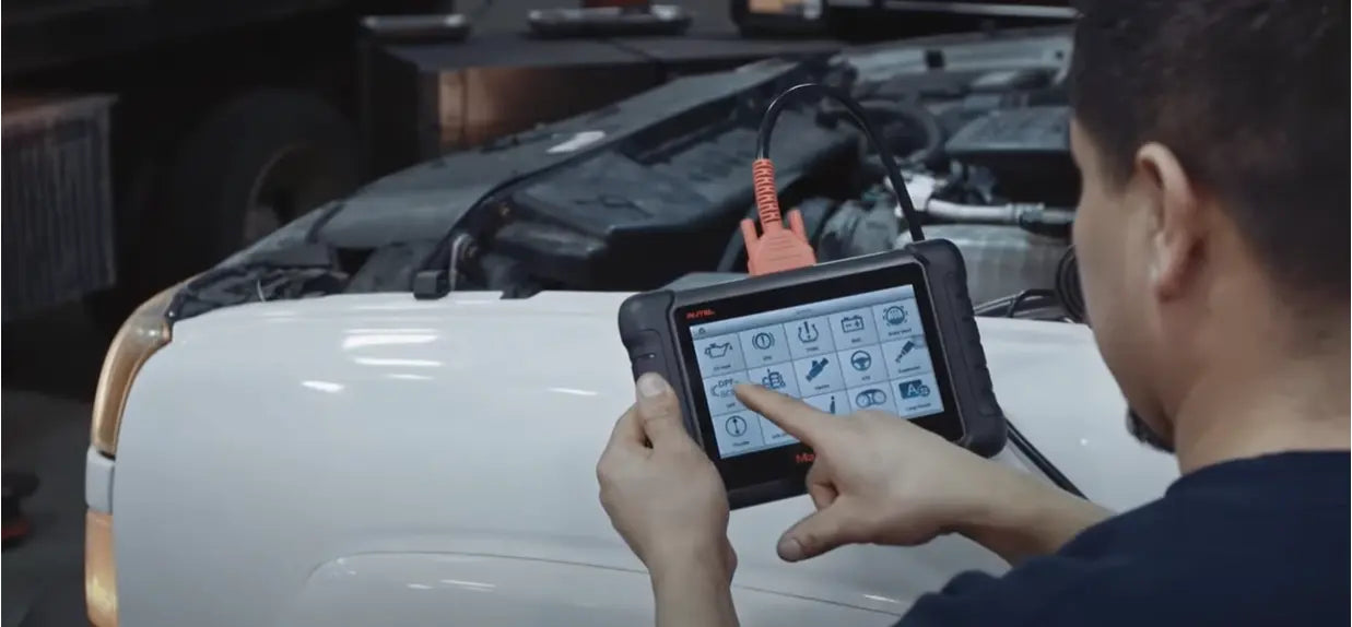 Performing a DPF regeneration using an Autel scanner.