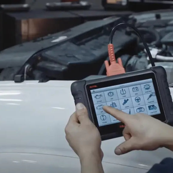 Performing a DPF regeneration using an Autel scanner.
